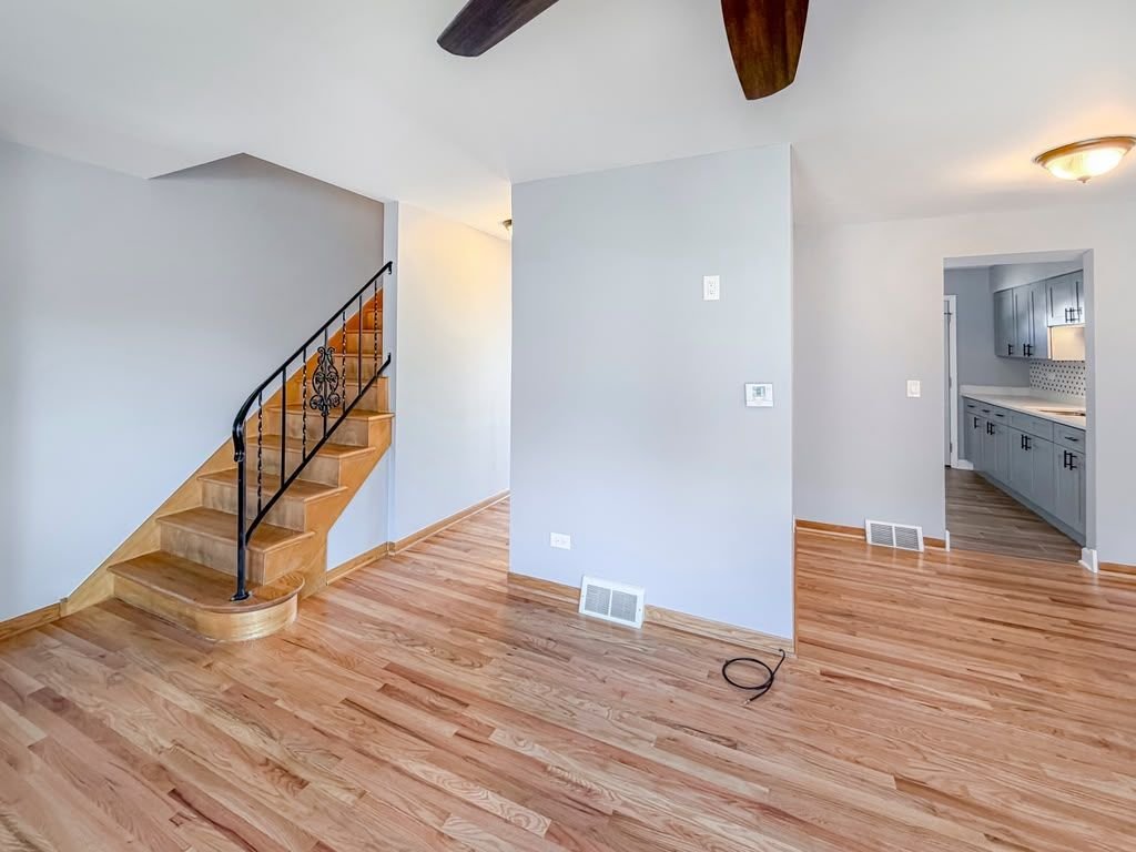 Refinished hardwood floors and staircase